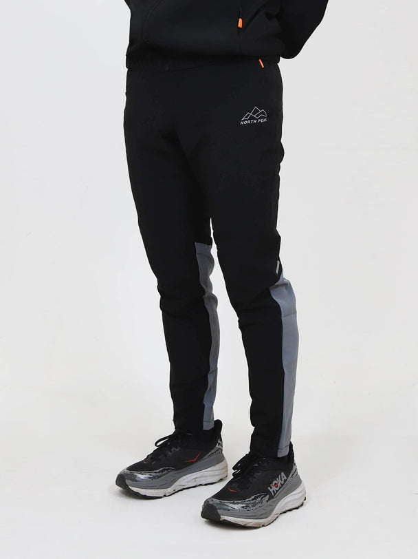 North Peak Glacier Track Pant in black with grey side panels and athletic fit for active lifestyle