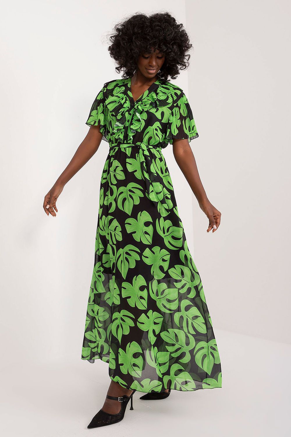 Summer Floral Dress with green leaf pattern, maxi length, short ruffle sleeves, heart neckline, and tie belt.