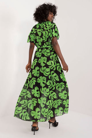 Summer floral dress with green leaf print, ruffled short sleeves, tie belt, heart neckline, maxi length, and elegant style.