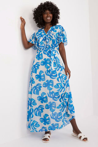 Summer Floral Dress with blue leaf print, maxi length, and ruffle sleeves.