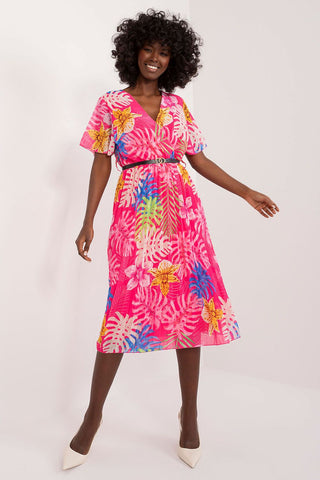 Summer floral dress with flared cut, envelope neckline, and pleated bottom hem.