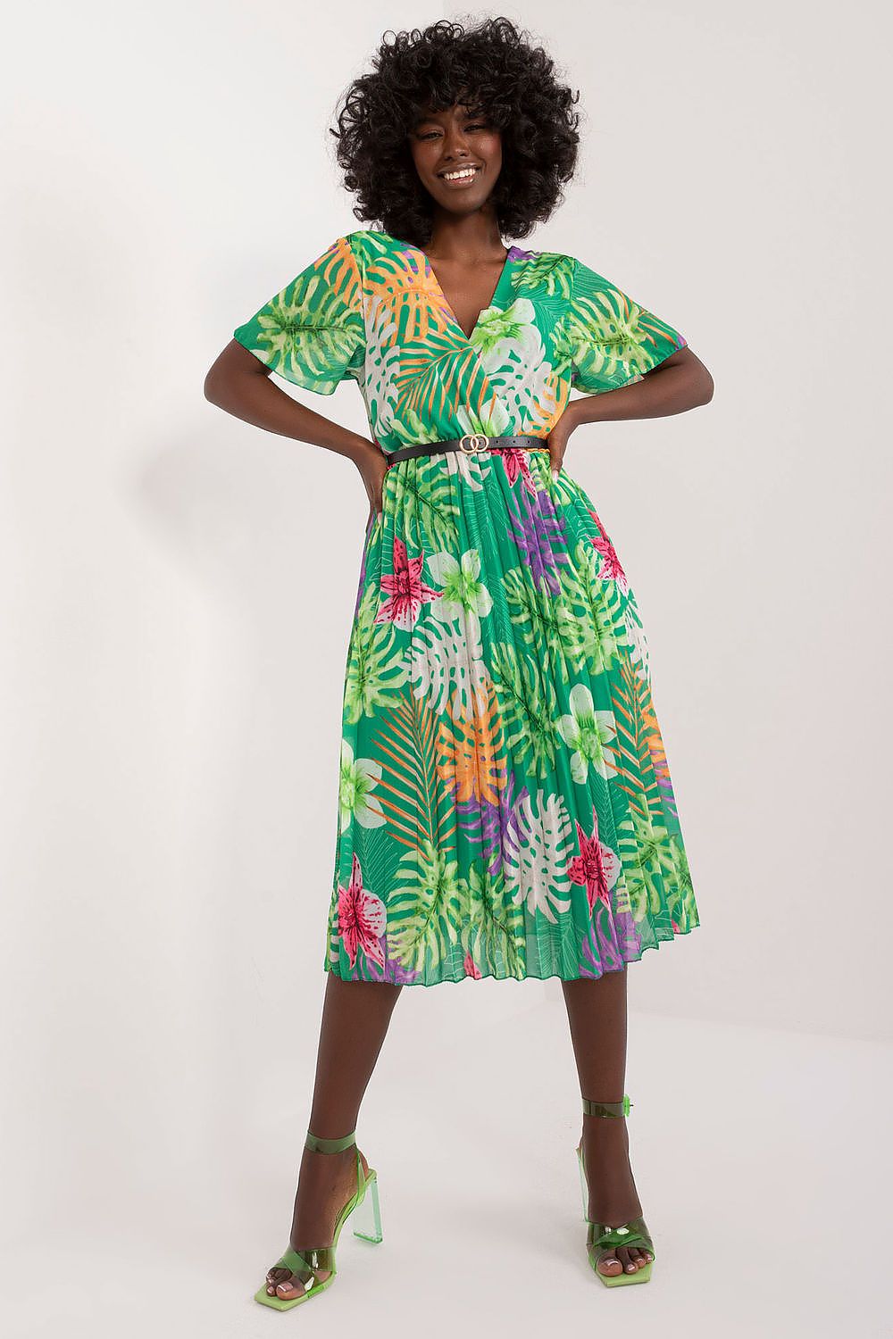 Summer floral dress with flared cut, short sleeves, and pleated hem.