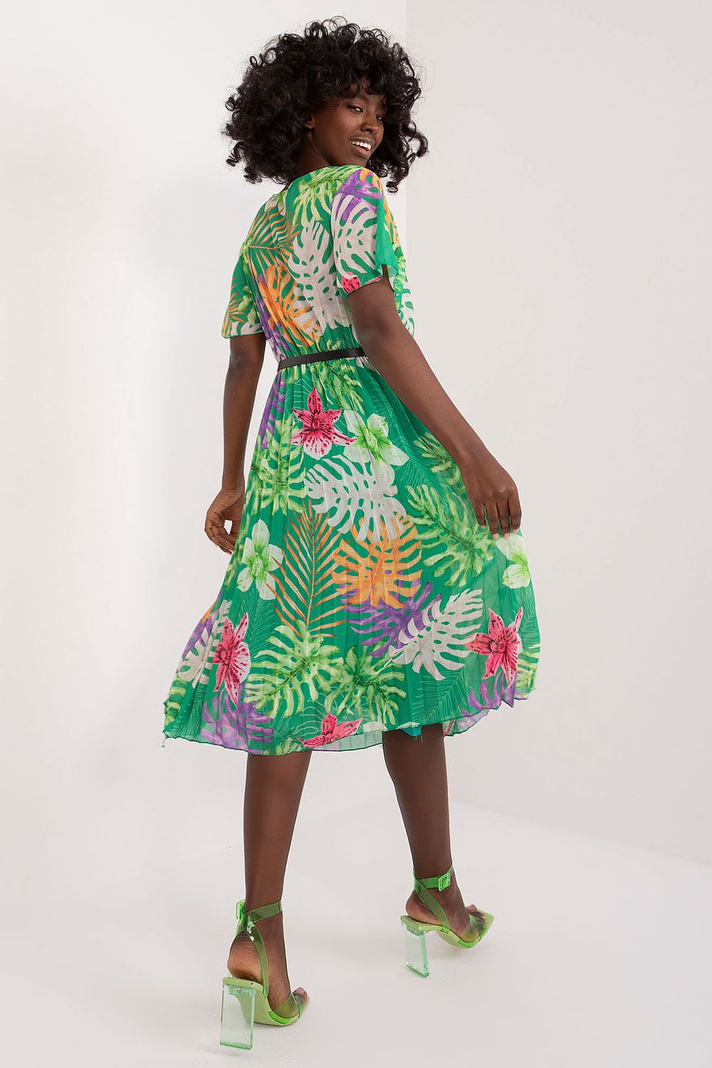 Summer Floral Dress with flared cut, envelope neckline, and pleated hem, ideal for any summer occasion.