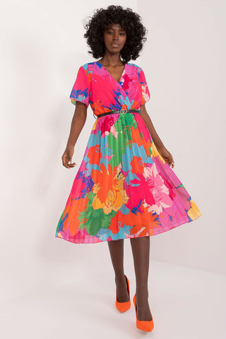 Summer floral dress with flared cut, short sleeves, envelope neckline, and pleated hem.