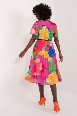 Summer Floral Dress with vibrant colors, flared cut, short sleeves, and pleated hem.