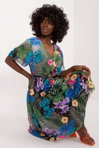 Summer floral dress with envelope neckline and pleated hem, featuring vibrant floral pattern, short sleeves, and a belt.