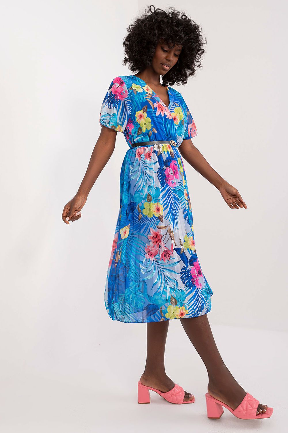 Summer floral dress with flared cut and envelope neckline.