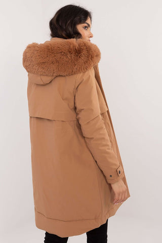Transitional jacket with detachable fur hood and waist belt.