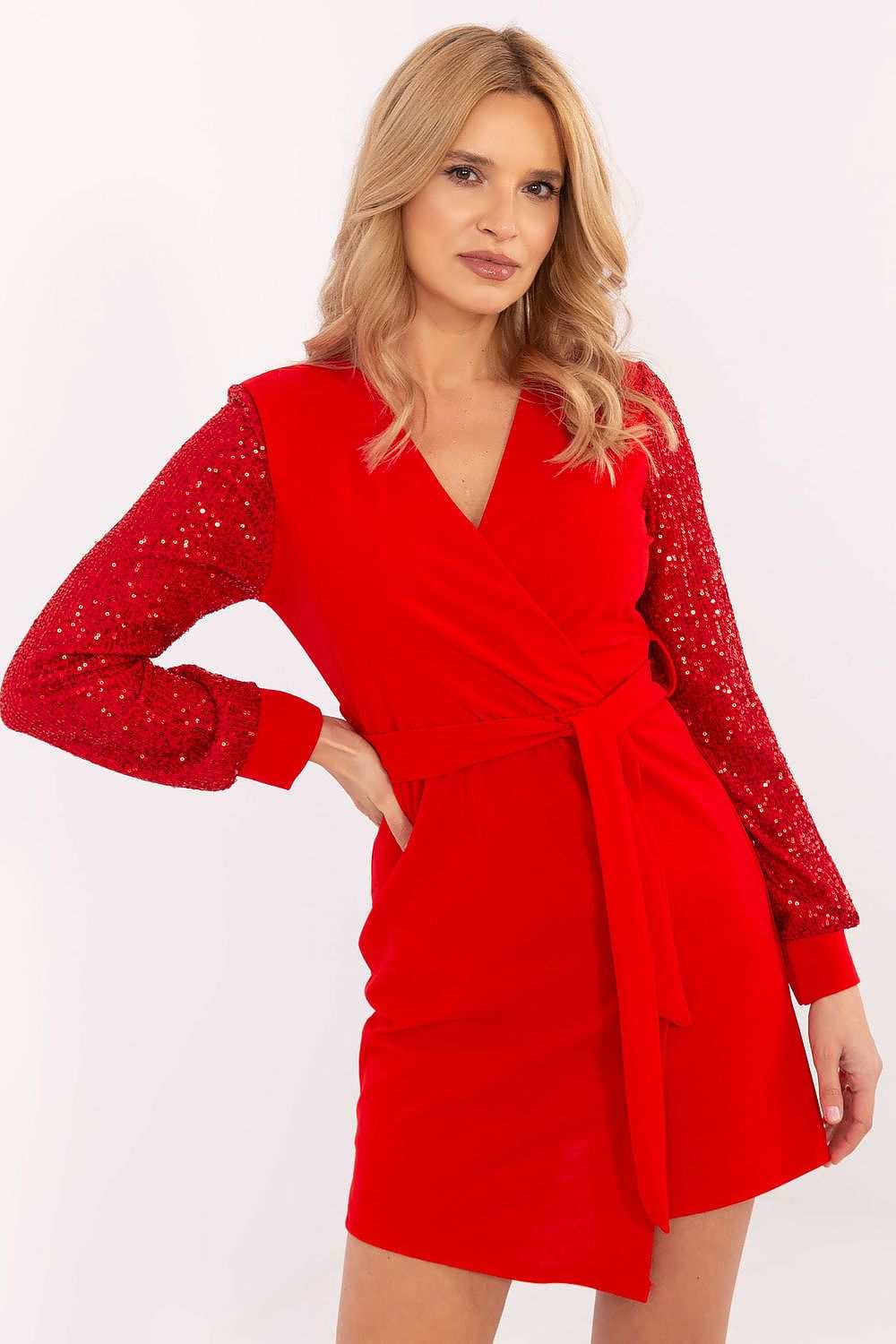 Short red dress with sequin long sleeves, wrap neckline, and waist tie.
