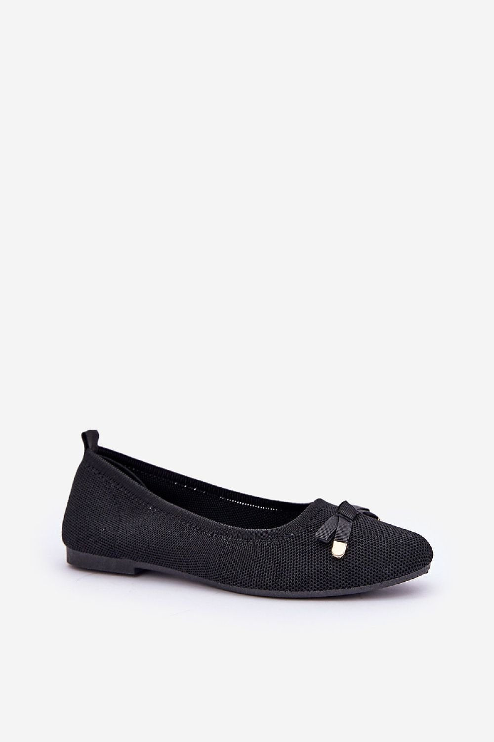 Women's black ballet flats with mesh material and bow detail.