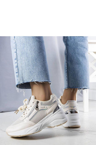Limited Edition Ani Trainers, beige wedge sneakers with white rubber sole, perfect for summer.