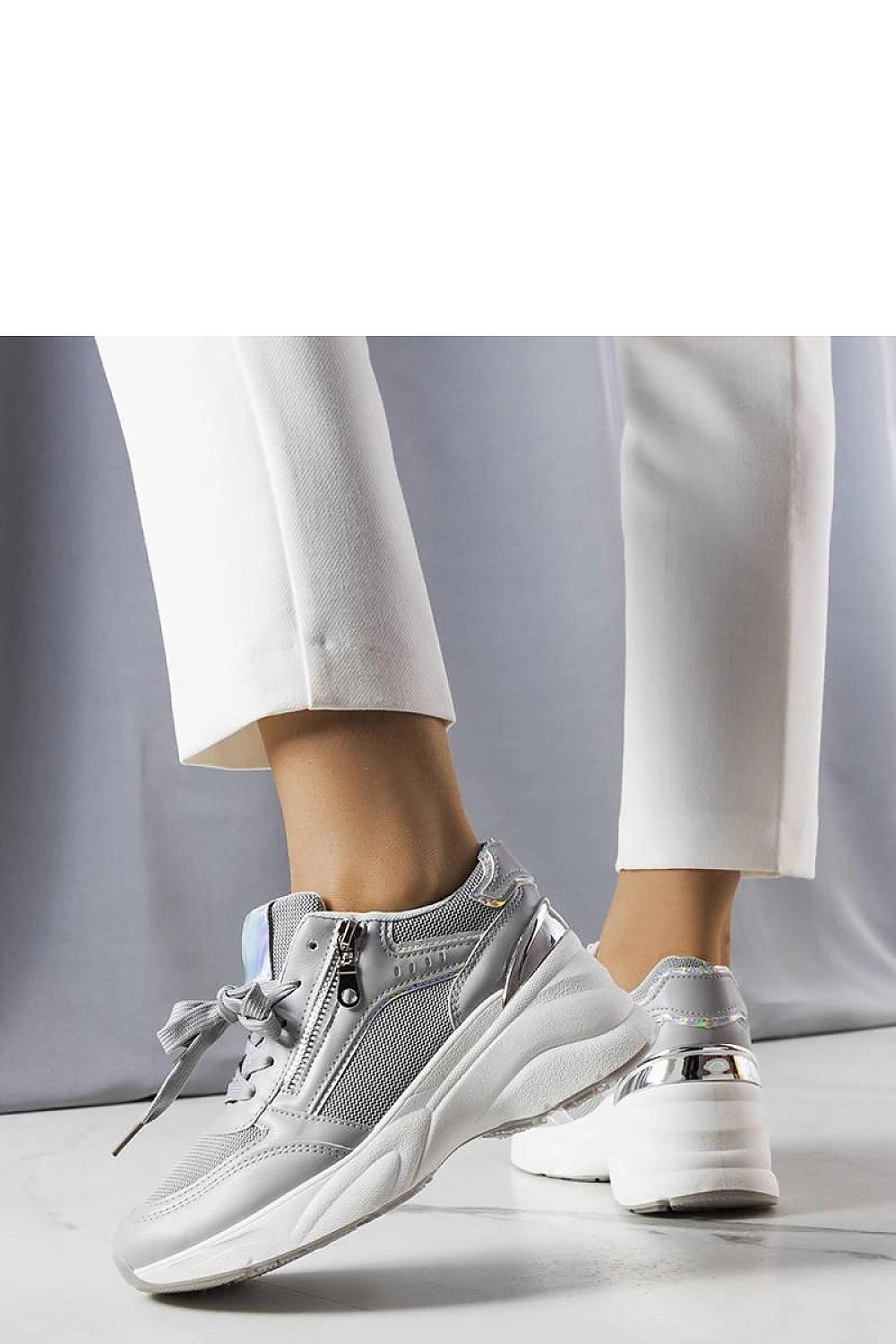 Limited edition Ani trainers with beige wedge, white rubber sole, and laced laces for summer comfort and style.