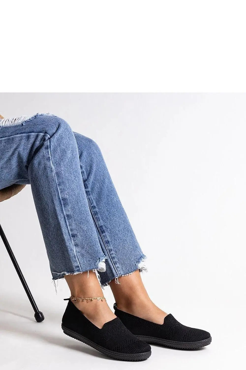 Black slip-on sneakers