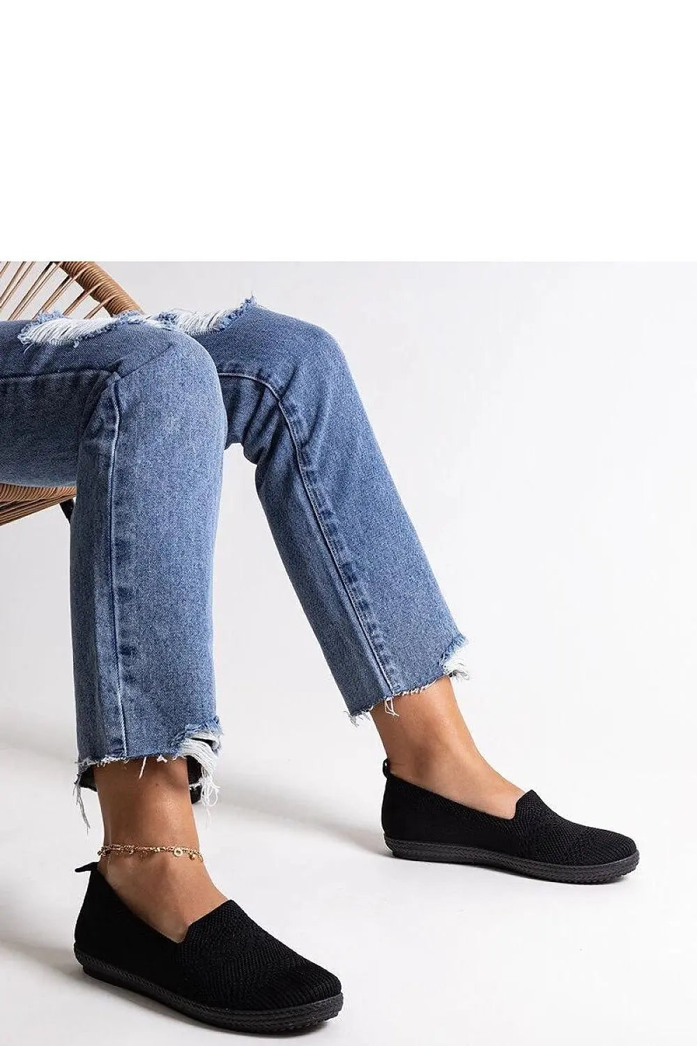 Black slip-on sneakers