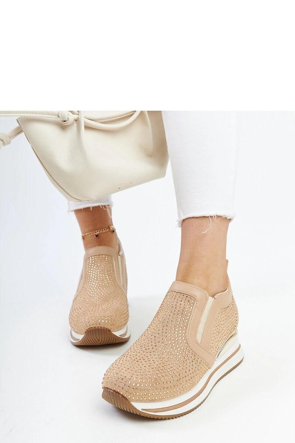 Brown wedge sneakers made of eco-leather with slip-on closure, ideal for spring-summer season.