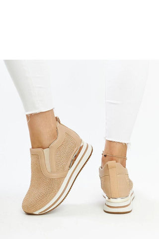 Brown wedge sneakers made of eco-leather with a comfortable rubber sole and slip-on design.