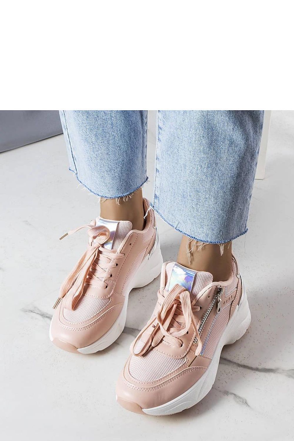 Limited edition beige wedge sneakers with white rubber sole and laced details, designed for summer comfort and style.