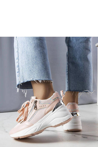 Limited edition beige wedge sneakers with white rubber sole and laced design.