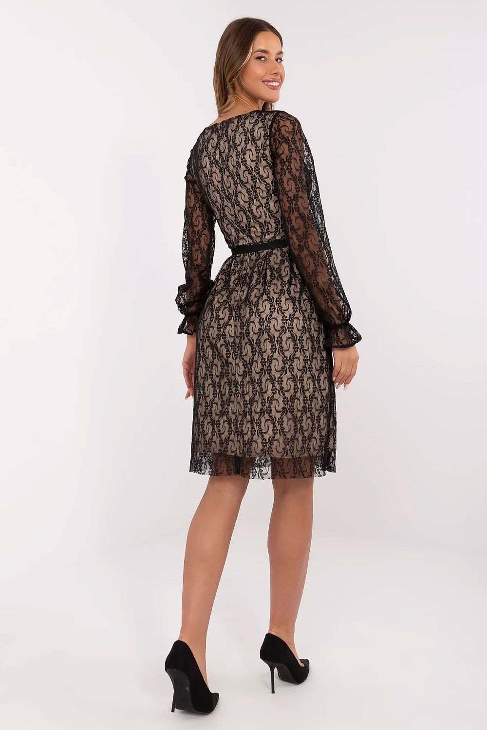 Elegant cocktail dress with lace overlay, long sleeves, tie belt, and knee-length hem.