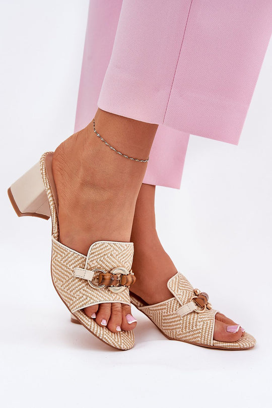Women's woven sandals with decorative front, pillar heel, perfect for summer outfits.