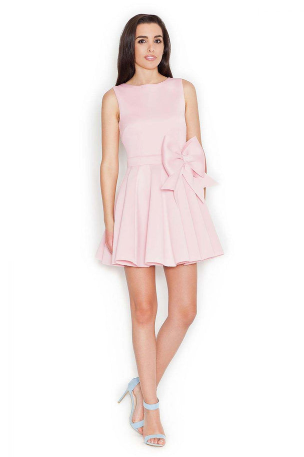 Women's short dress with wide straps, side bow, fitted top, and flared bottom.
