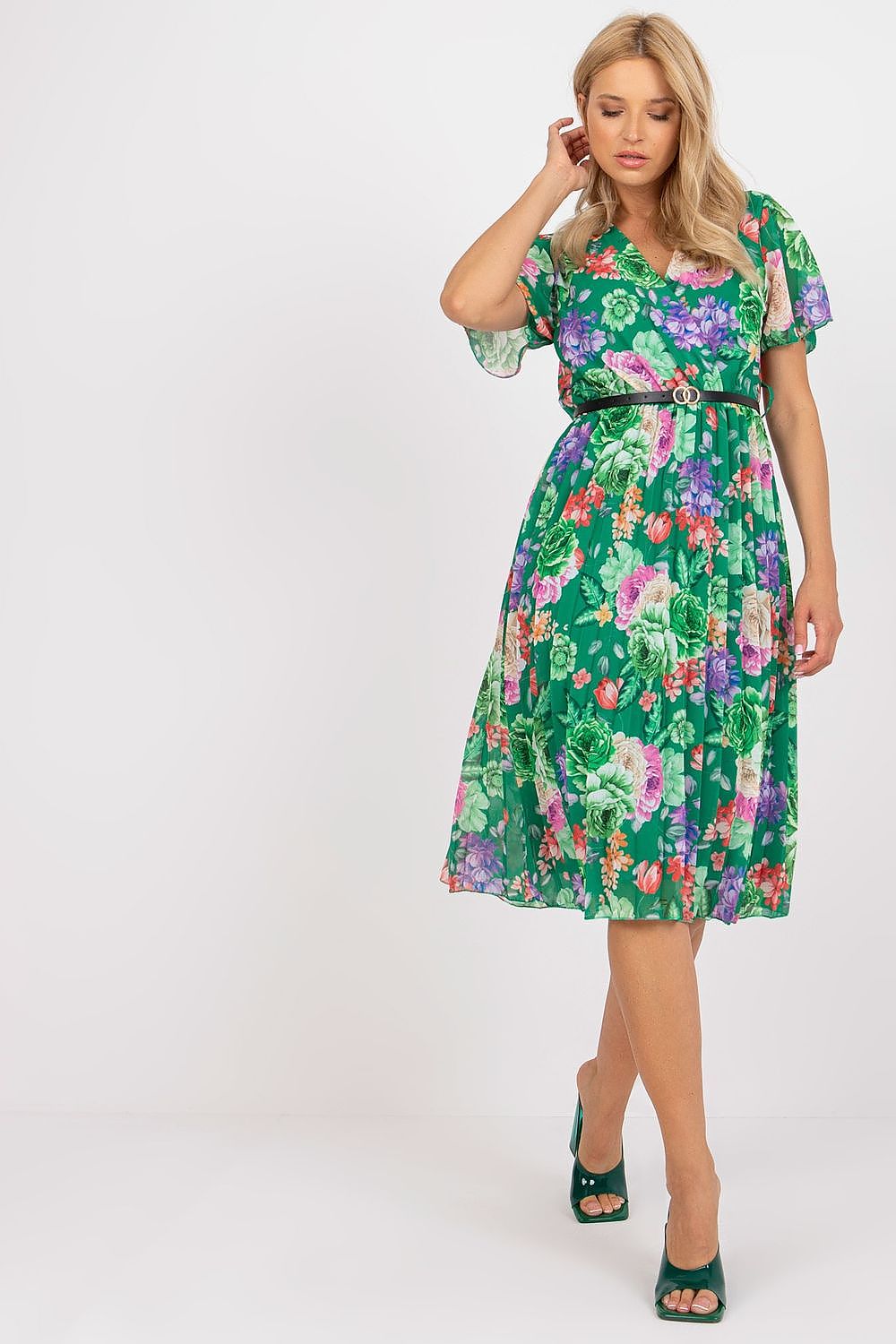 Summer floral dress with flared cut, short sleeves, and envelope neckline.