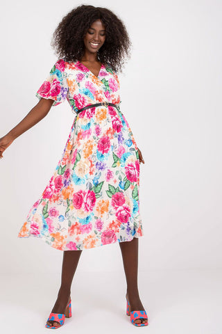 Summer Floral Dress with envelope neckline, short sleeves, and pleated hem.