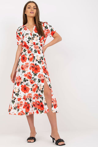 Women's summer floral dress with front buttons, bottom slit, and frill detailing.