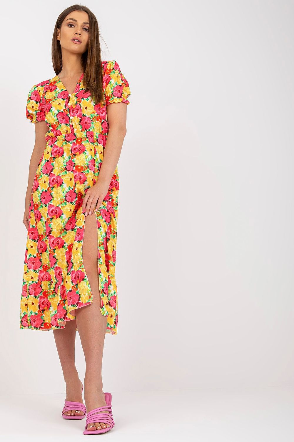 Women's summer floral dress with short sleeves, front buttons, and a bottom slit.
