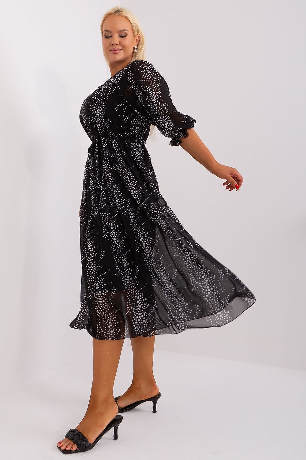 Plus size dress with 3/4 sleeves, round neckline, and waist tie, ideal for various occasions.