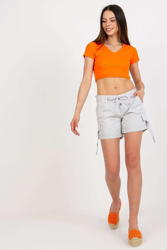 Women’s button-down shorts with tie waist and pockets.