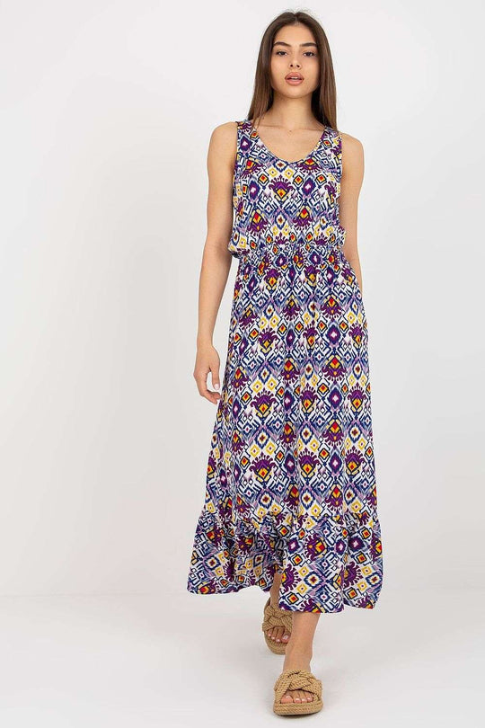 Summer floral dress with thick straps and heart neckline, featuring a ruffled bottom.