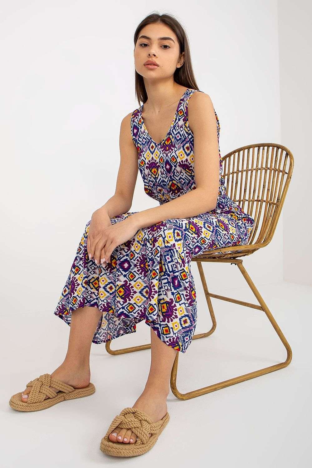 Summer floral dress with thicker straps and heart neckline.
