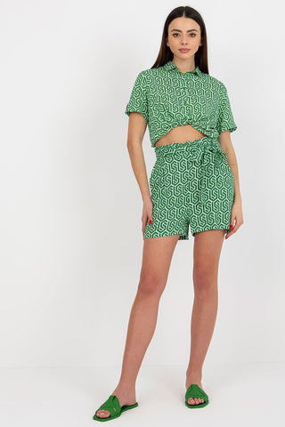 Women's high-waisted summer shorts with tie waistband and slip pockets.