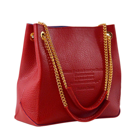 Red Loving Handbag from LovUnlimited Collection made from Italian leather with engraved poem, featuring gold chain handles and detachable inner pouch.